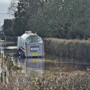 An Arla milk tanker is stuck in floodwater near Yeovil.
