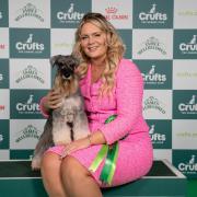 Manny and his owner Beccie after winning Best of Breed at Crufts.