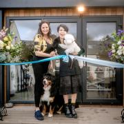Kelly Davis and Lianne Ong with their dogs at the opening of KD Spa