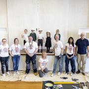 Leonardo volunteers painted the hall at Maiden Beech Primary School.