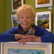 Sue Walsh with one of her artworks
