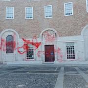 Red paint and graffiti have been daubed on the County Hall building for the third time