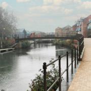 Artist's impression: how the widened footbridge over the River Tone could look.