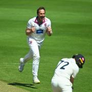 Josh Davey celebrates taking a wicket against Kent.