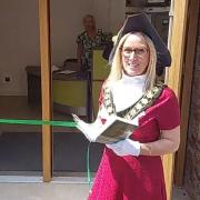 Mayor of Glastonbury Zoe Prince opening the Baily's Buildings