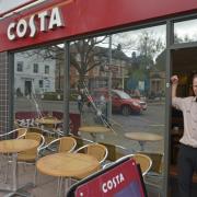 SIMON Ford, manager of Costa, next to the windows which were attacked with a hammer. PHOTO: Somerset Photo News.