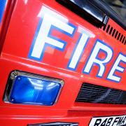 Firefighters tackle house fire in Wellington