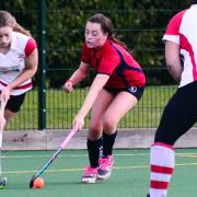 TUSSLE: Jodie Baker (left) in action for Taunton Civil Service 2nds. Pic: Steve Richardson
