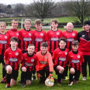 ARCHERS: Avishayes U12s (from left) - back - Joe Parry, Cian Brown, Finley Downes, Keegan Hounsell, George Chapple, Jayden Pinney, Claire Weller (manager); front - Gavin Lewis, Ethan Mcnally, Cody Cornillius, Cody Weller, Haydn Otterbeck.