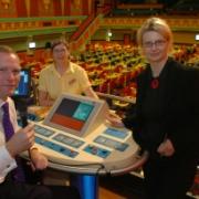 Jeremy Browne MP reads the numbers at Taunton Mecca Bingo as part of his campaign with staff members May Little and Monika Borska-Ulatowska