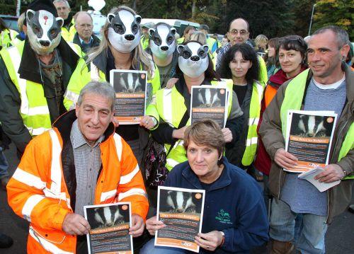 Adrian Coward from the Somerset Badger Group and Pauline Kidner from Secret World, which organised the event, with protesters at Dunster. PHOTO: Steve Guscott