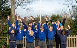 Parkfield Primary school hoist their Green Flag with help from HMG.