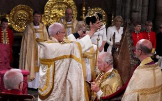 King Charles III is crowned with St Edward's Crown during his Coronation ceremony.