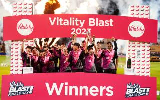 Somerset players lift the Vitality Blast trophy in July 2023.