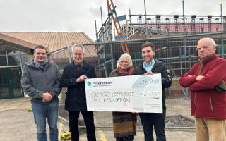 The presentation of the cheque at the community centre
