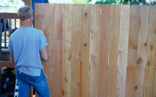 If you own the fence and it is within your boundary your neighbour is not allowed to move it or take it down.
