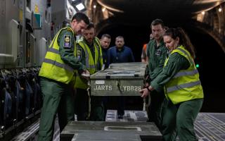 Image shows Royal Navy 815 Squadron service personnel loading Wildcat rotor blades onto the back of RAF C-17, at RNAS Yeovilton on the 5th of March 2025.
