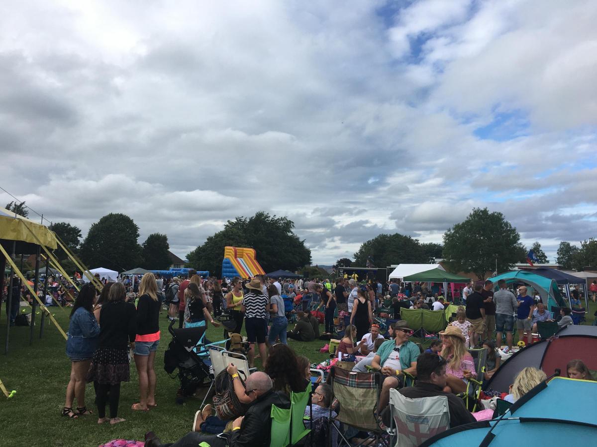 CROWDS: Hundreds of people set up their deckchairs to enjoy the festival