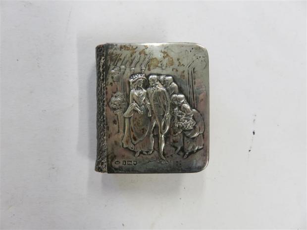 Somerset County Gazette: UNUSUAL: Within the collection was this silver miniature book