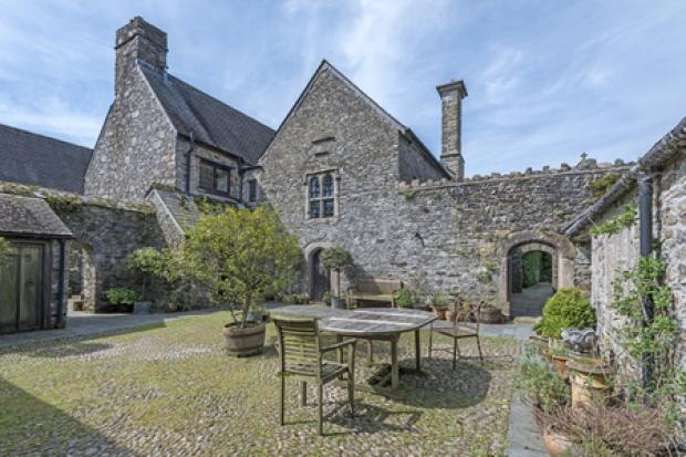 RALEIGH'S HOME: A historically-significant manor house which was once the home of Sir Walter Raleigh’s family has been put up for sale for £2 million. Picture: SWNS